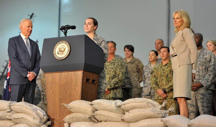 First Lt. Karen, the 380th Expeditionary Aircraft Maintenance Squadron officer in charge of the Sentry Aircraft Maintenance Unit, introduces Vice President Joe Biden to U.S. and coalition personnel during Biden’s visit to an undisclosed location in Southwest Asia, March 7, 2016. Biden endorsed Karen’s application to the U.S. Air Force Academy almost a decade ago before he accepted his current position as vice president. (U.S. Air Force photo/Staff Sgt. Kentavist P. Brackin)