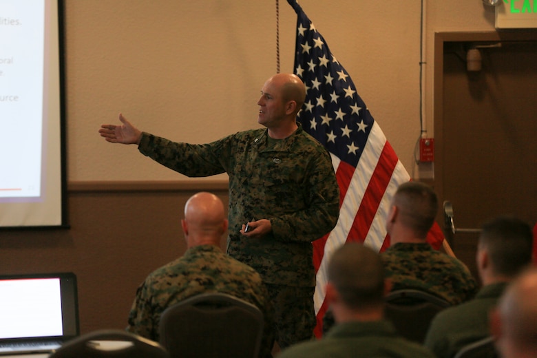 Navy Capt. Stephen M. Lee, assistant chief of staff, Religious Ministries, talks to Combat Center leadership at the 2016 Suicide Prevention Symposium held at the Officers Club, Feb. 24, 2016. The two-hour symposium dove into the analytics of suicide in the military and informed the leaders on the resources available to them and what they can do within their respective units to prevent it. (Official Marine Corps Photo by Cpl. Julio McGraw/Released)