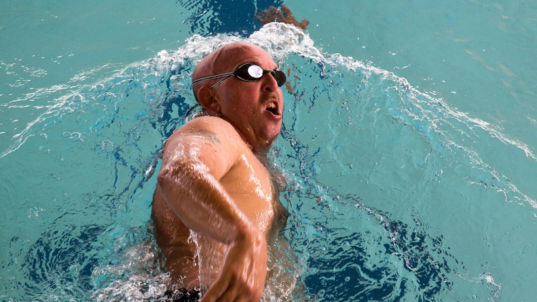 U.S. Marine Corps Staff Sgt. Jack Stanfield, a Martinsville, Ind., native with Wounded Warrior Battalion– East, performs the sidestroke at swim practice during the 2016 Marine Corps Trials at Marine Corps Base Camp Pendleton, Calif., March 6, 2016. The Marine Corps Trials allows wounded, ill, and injured Marines and veterans to come together in friendly competition to build camaraderie through a variety of sporting events.