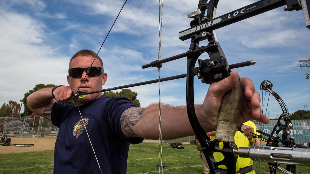 U.S. Marine Cpl. Michael Horton, a Port St. Lucie, Fla., native with Wounded Warrior Battalion – West, fires an arrow during practice at the 2016 Marine Corps Trials at Marine Corps Base Camp Pendleton, Calif., March 4, 2016. The Trials, an eight-event adaptive sports competition, is hosted by the Wounded Warrior Regiment, the Marine Corps command that facilitates, the integration of non-medical and medical care to wounded, ill, and injured Marines and their families. The Trials began March 2, 2016, and end March 9, 2016.