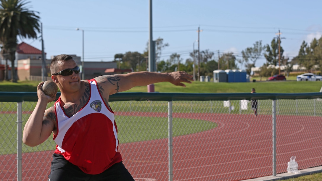 U.S. Marine Corps Sgt. Jacob Baumann, a Newberry, Fla., native with Wounded Warrior Battalion-East, prepares to throw the shot during shot put practice at the Marine Corps Trials at Marine Corps Base Camp Pendleton, Calif., March 6, 2016. The Trials, an eight-event adaptive sports competition, is hosted by the Wounded Warrior Regiment, the Marine Corps command that facilitates the integration of non-medical and medical care to wounded, ill, and injured Marines and their families. The Trials began March 2, 2016, and end March 9, 2016.