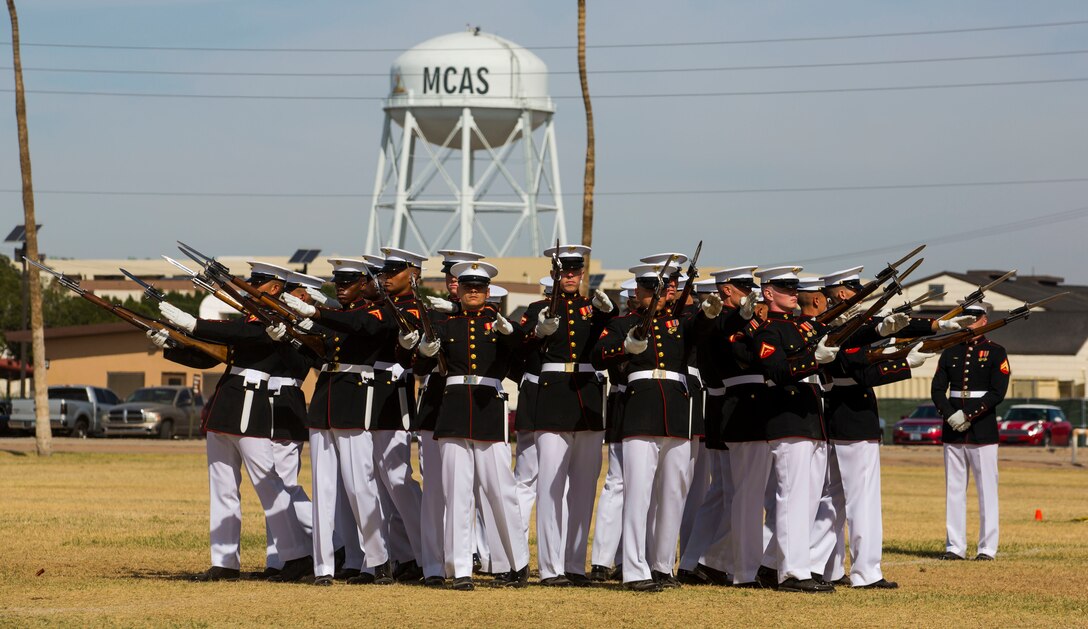 The United States Marine Corps Silent Drill Platoon holds a performance for station military personnel and families at Marine Corps Air Station Yuma, Ariz., March 3, 2016. Based out of the “Oldest Post of the Corps,” Marine Barracks 8th & I, Washington D.C., the revered platoon settles into Yuma every year for spring training, as they prepare for their tour of the West Coast. (U.S. Marine Corps photo by Lance Cpl. Brendan King/ Released)