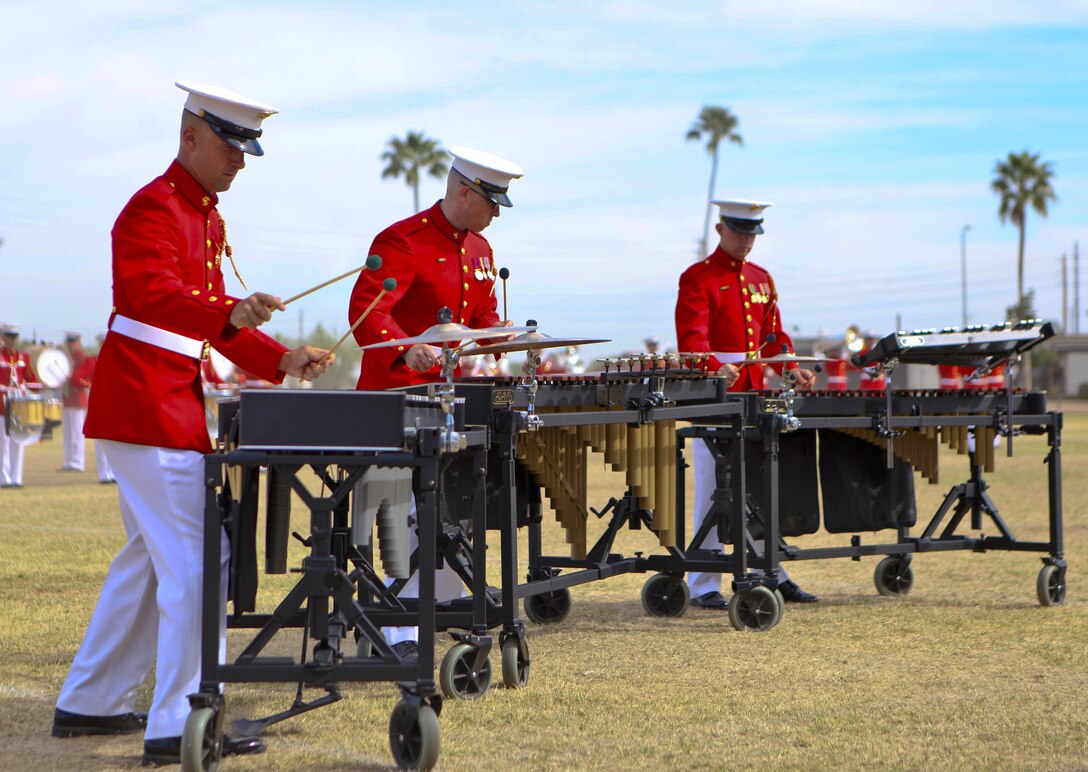Members of the United States Marine Drum and Bugle Corps performs during the annual Battle Colors Ceremony aboard Marine Corps Air Station Yuma, Ariz., March 3, 2016. (U.S. Marine Corps photo by Cpl. Scott Roguska/Released)