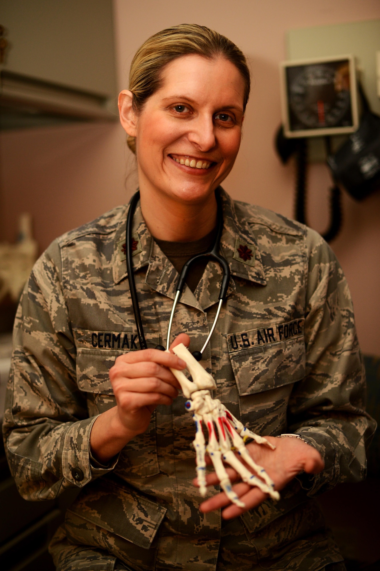 U.S. Air Force Maj. (Dr.) Danielle Cermak, 20th Medical Group chief of medical staff, holds a skeletal hand prop at Shaw Air Force Base, S.C., Feb. 12, 2016. Cermak won the Air Force Medical Service’s Chief of Medical Staff Commitment to Excellence Award. Cermak serves as the senior medical officer, chief of quality and the principal medical advisor to the 20th MDG commander. (U.S. Air Force photo by Senior Airman Jonathan Bass)