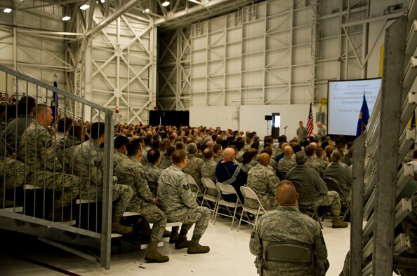 Col. Scott McLaughlin, commander of the 446th Airlift Wing, speaks to Airmen at a commander's call on Joint Base Lewis McChord, Wash., March 6. The 446th held Wingman Day after the commander's call to educate Airman on essential life skills. (U.S. Air Force Reserve photo by Staff Sgt. Daniel Liddicoet)