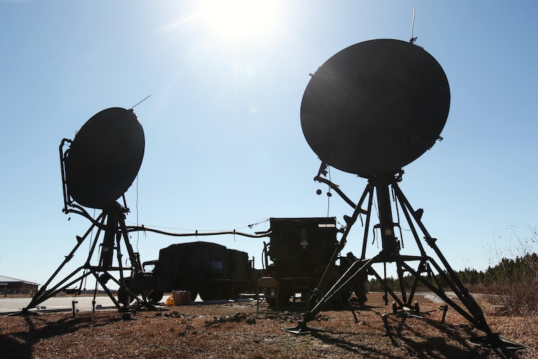 AN/TRC-170 tropospheric scatter systems are utilized during a communications field exercise with Company B, Marine Wing Communications Squadron 28 at Marine Corps Air Station Cherry Point, N.C., March 3, 2016. The MWCS-28 incorporates numerous systems ranging from single-channel radios to systems with an emphasis on interoperability and beyond line-of-sight communications for a broad spectrum of information services. During the exercise, Bravo Company provided their own Tactical Air Operations Center, Tactical Air Command Center and simulated unmanned aerial vehicle squadron requests, giving the Marines a broader understanding on what roles requesting agencies play during operations within a communications squadron. (U.S. Marine Corps photo by Pfc. Nicholas P. Baird/Released)