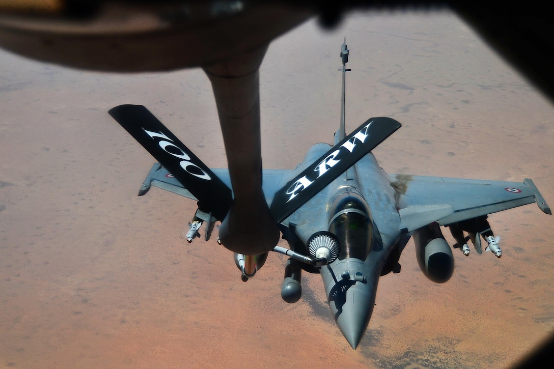 A French Dassault Rafale fighter aircraft flies toward a KC-135 Stratotanker aircraft during a refueling mission in support of Operation Juniper Micron over North Africa, Feb. 26, 2016. Air Force photo by Senior Airman Erin Trower