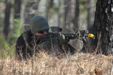 U.S. Army Pvt. Amanuel Ambrose of Delta Company, 3rd Battalion, 187th Infantry Division, 101st Airborne Division, fires his M4 carbine during a simulated complex ambush on Joint Base McGuire-Dix-Lakehurst, N.J., March 3, 2016. Ambrose is tasked as a notional opposing force to provide training units with improved readiness during Combat Support Training Exercise 78-16-01.