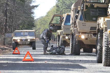 U.S. Army Soldiers of the 365th Transportation Detachment conduct medical evacuation training during a simulated complex ambush on Base McGuire-Dix-Lakehurst, N.J., March 3, 2016. Soldiers of the 365th Transportation Detachment are participating in Combat Support Training Exercise 78-16-01 to improve unit readiness.