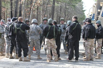 U.S. Army Soldiers of the 365th Transportation Detachment conduct an after action review following a simulated complex ambush on Base McGuire-Dix-Lakehurst, N.J., March 3, 2016. Soldiers of the 365th Transportation Detachment are participating in Combat Support Training Exercise 78-16-01 to improve unit readiness.