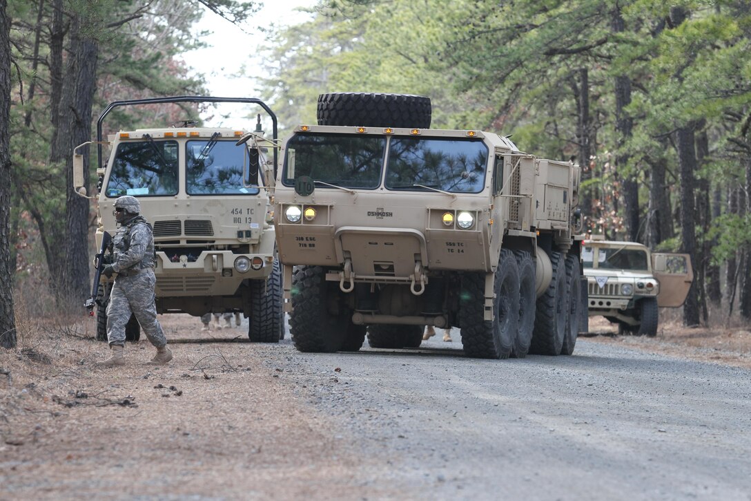 U.S. Army Soldiers of the 309th Transportation Detachment conduct a vehicle recovery following a simulated complex ambush on Base McGuire-Dix-Lakehurst, N.J., March 3, 2016. Soldiers of the 309th Transportation Detachment are participating in Combat Support Training Exercise 78-16-01 to improve unit readiness.