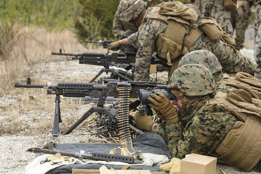 Marines with Bravo Company, 2nd Law Enforcement Battalion, participated in familiarization training at Camp Lejeune, N.C., March 4, 2016, in order to improve their marksmanship skills with the M240 machine gun and M249 squad automatic weapon. The purpose of the shoot was to hone their accuracy, communication abilities and suppressive fire capabilities in order to prepare the unit for several upcoming training exercises. (U.S. Marine Corps photo by Lance Cpl. Aaron K. Fiala/Released)