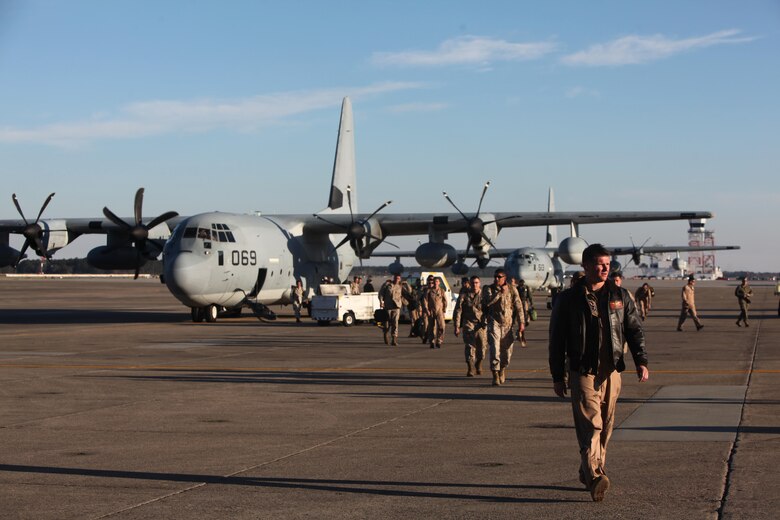 Marines with Marine Aerial Refueler Transport Squadron 252 walk away from a KC-130J Super Hercules at Marine Corps Air Station Cherry Point, N.C., Jan. 21, 2016. The Marines deployed to Africa and Spain, where they assisted the Personnel Recovery Task Force by working hand-in-hand with other United States military branches. The mission focused on the skills and abilities of service members to successfully reintegrate and recover isolated personnel. VMGR-252 strives to provide assault transport of personnel, equipment and supplies; additionally they provide aerial refueling services to fixed and rotary wing aircraft. On Jan. 13, VMGR-252 welcomed home another detachment, who remained in Moron, Spain. In total, the detachment’s Marines moved over 2,900 passengers, 778,000 pounds of cargo and delivered 845,000 pounds of fuel to receiver aircraft. (U.S. Marine Corps photo by Cpl. Unique Roberts/ Released)