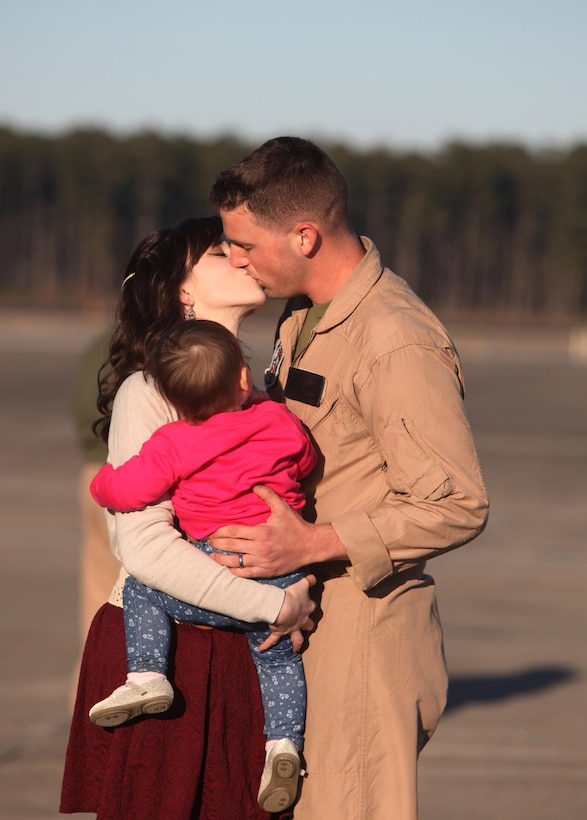 Cpl. Corey Wright greets his family at Marine Corps Air Station Cherry Point, N.C., Jan. 21, 2016. The Marines deployed to Africa and Spain, where they assisted the Personnel Recovery Task Force by working hand-in-hand with other United States military branches. The mission focused on the skills and abilities of service members to successfully reintegrate and recover isolated personnel. On Jan. 13, VMGR-252 welcomed home another detachment, who remained in Moron, Spain. In total the detachment’s Marines moved over 2,900 passengers, 778,000 pounds of cargo and delivered 845,000 pounds of fuel to receiver aircraft. Wright is a fixed-wing aircraft crew chief with VMGR-252. (U.S. Marine Corps photo by Cpl. Unique Roberts/ Released)