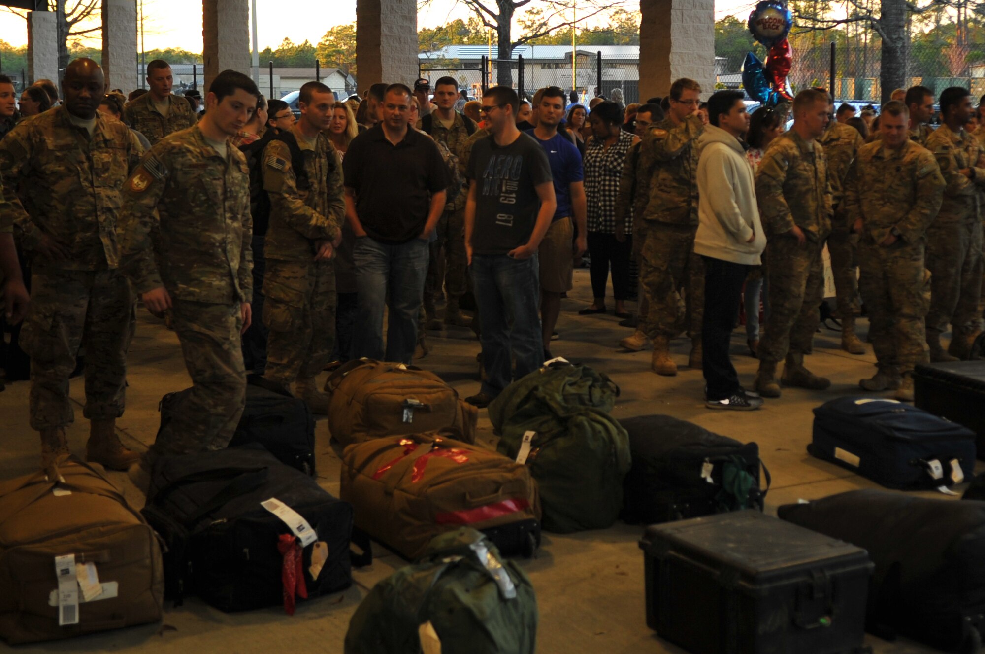 Air Commandos wait to receive their bags during Operation Homecoming at the deployment control center, Hurlburt Field, Fla., March 6, 2016. Operation Homecoming welcomed home Air Commandos from their overseas deployment. (U.S. Air Force photo by Airman 1st Class Joseph Pick)