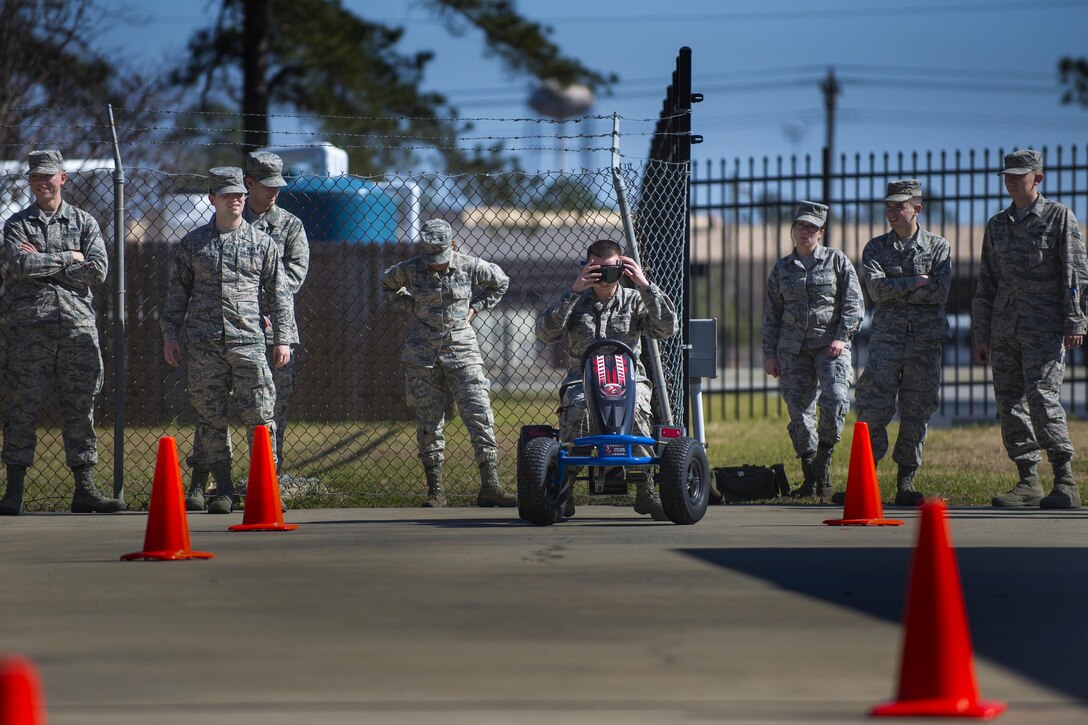 U.S. Air Force Airman 1st Class Austin Rice, 23d Component Maintenance Squadron aerospace propulsion apprentice, secures his ‘drunken goggles’ before attempting to drive at an alcohol drug abuse prevention and treatment briefing, Feb. 11, 2016, at Moody Air Force Base, Ga. ADAPT personnel allow Airmen to attempt simple tasks while wearing goggles that cause a reduction in vision and motor skills much like the reductions caused by alcohol. (U.S. Air Force photo by Airman Daniel Snider/Released)