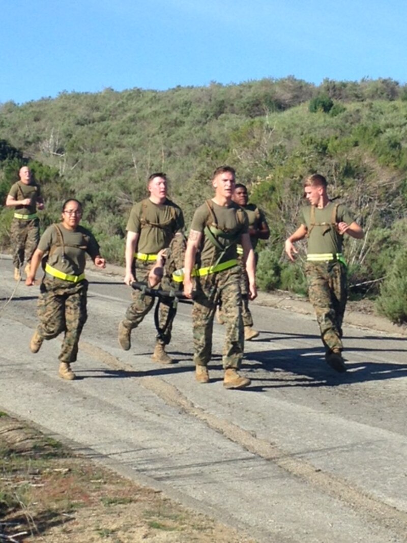 Corporals of Class 349-16 execute the 3.8 Mile Casualty Evacuation course aboard Camp Pendleton California.