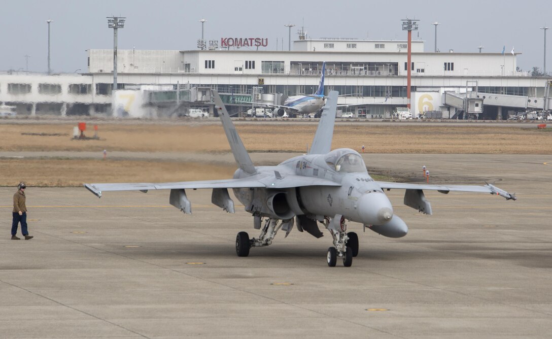 An FA-18A++ Hornet with Marine Fighter Attack Squadron (VMFA) 314, forward deployed to Marine Corps Air Station Iwakuni, Japan, arrives at Komatsu Air Base, Japan, for the Komatsu Aviation Training Relocation exercise March 7, 2016. VMFA-314, also known as the “Black Knights,” took the lead in conducting dissimilar air combat training and bilateral tactical mission training with the Japan Air Self-Defense Force. Every ATR contributes to U.S. and Japan forces’ understanding of each other’s capabilities and methods by fostering peace and stability through increased interoperability. (U.S. Marine Corps photo by Cpl. Nicole Zurbrugg/Released)