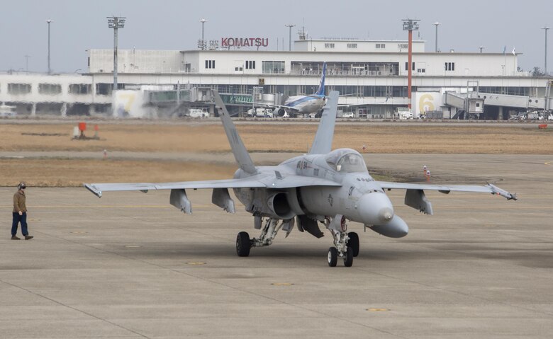 An FA-18A++ Hornet with Marine Fighter Attack Squadron (VMFA) 314, forward deployed to Marine Corps Air Station Iwakuni, Japan, arrives at Komatsu Air Base, Japan, for the Komatsu Aviation Training Relocation exercise March 7, 2016. VMFA-314, also known as the “Black Knights,” took the lead in conducting dissimilar air combat training and bilateral tactical mission training with the Japan Air Self-Defense Force. Every ATR contributes to U.S. and Japan forces’ understanding of each other’s capabilities and methods by fostering peace and stability through increased interoperability. (U.S. Marine Corps photo by Cpl. Nicole Zurbrugg/Released)
