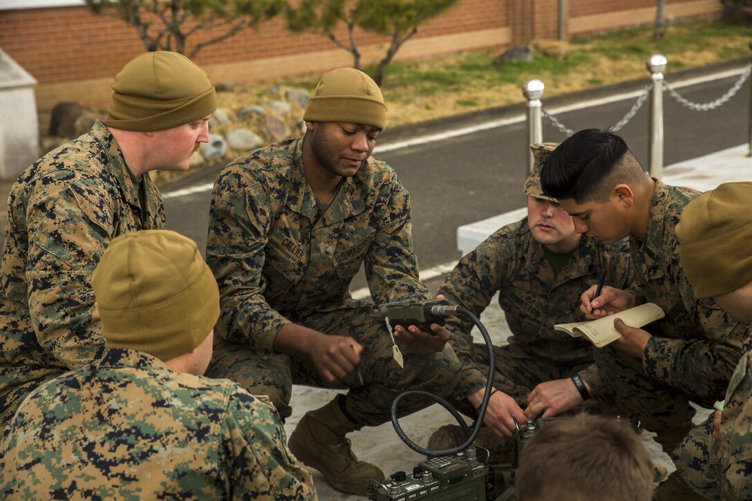 Sgt. Jacorian Callier, from Houston, Texas, gives a hip-pocket class to his Marines on different communications equipment March 6, 2016 in Pohang, Republic of Korea. The Marines are participating in Ssang Yong 16. Ssang Yong 16 is a biennial combined amphibious exercise conducted by forward-deployed U.S. forces with the Republic of Korea Navy and Marine Corps, Australian Army and Royal New Zealand Army Forces in order to strengthen our interoperability and working relationships across a wide range of military operations - from disaster relief to complex expeditionary operations. Callier is a radio operator with 5th ANGLICO. (U.S. Marine Corps photo by Lance Cpl. Kelsey M. Dornfeld/ Released)