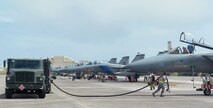 Airman 1st Class Christopher Avila, 36th Logistics Readiness Squadron Fuels Management Flight mobile distributor, carries a fuel hose to an aircraft during exercise Cope North 16, Feb. 23, 2016, at Andersen Air Force Base, Guam. During the exercise, refueling teams worked with aircrews from across the Indo-Asia Pacific region, building relationships and interoperability. (U.S. Air Force photo/Airman 1st Class Alexa Ann Henderson)