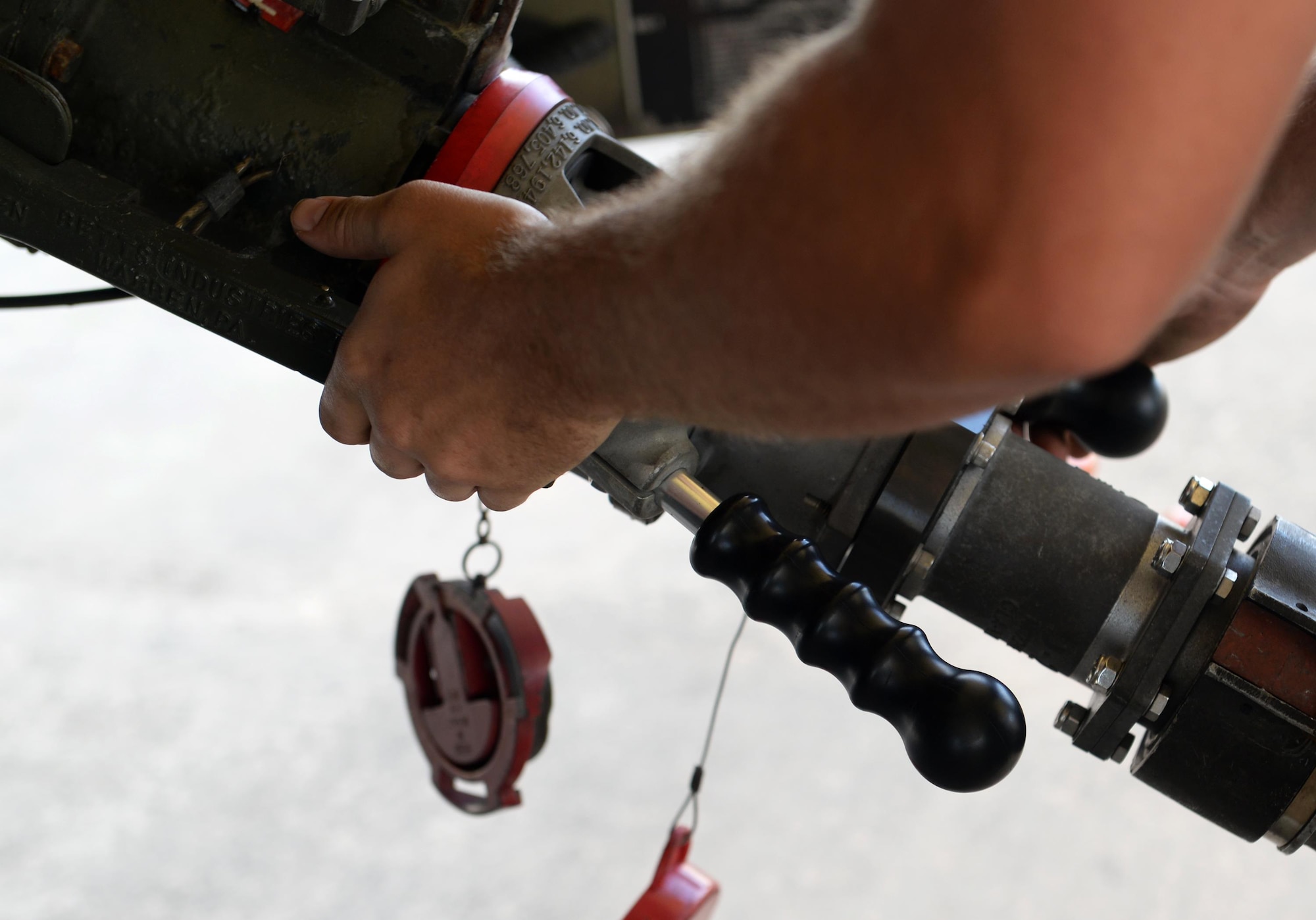 Airman 1st Class Nicholas Blanchette, 36th Logistics Readiness Squadron Fuels Management Flight mobile distributor, refills an R-11 refueling truck Feb. 26, 2016, at Andersen Air Force Base, Guam. The R-11 trucks can hold up to 6,000 gallons of fuel, enabling the teams to quickly refuel smaller aircraft such as fighter jets. (U.S. Air Force photo/Airman 1st Class Alexa Ann Henderson)