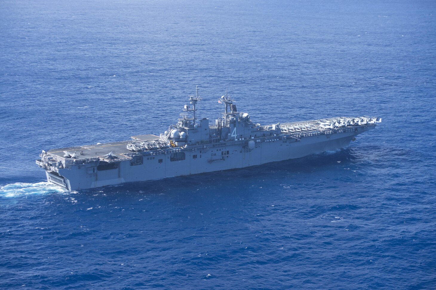 160215-N-YR245-130 PACIFIC OCEAN (Feb. 15, 2016) Amphibious assault ship USS Boxer (LHD 4) transits the Pacific Ocean. More than 4,500 Sailors and Marines from Boxer Amphibious Ready Group and the 13th Marine Expeditionary Unit (13th MEU) are transiting the Pacific Ocean to the 3rd, 5th and 7th Fleet areas of operations. (U.S. Navy photo by Mass Communication Specialist Seaman Craig Z. Rodarte/Released)