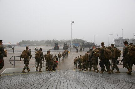 U.S. Marines with Combat Logistics Detachment 39, 9th Engineer Support Battalion, 3rd Marine Logistics Group, III Marine Expeditionary Force, disembark from a high speed vessel in support of exercises Freedom Banner/Ssang Yong at Pier 9, Pohang seaport, South Korea, March 5, 2016. Exercise Ssang Yong 2016 is a biennial military exercise focused on strengthening the amphibious landing capabilities of the Republic of Korea, the U.S., New Zealand and Australia. (U.S. Marine Corps photo by Cpl. Allison Lotz/Released)