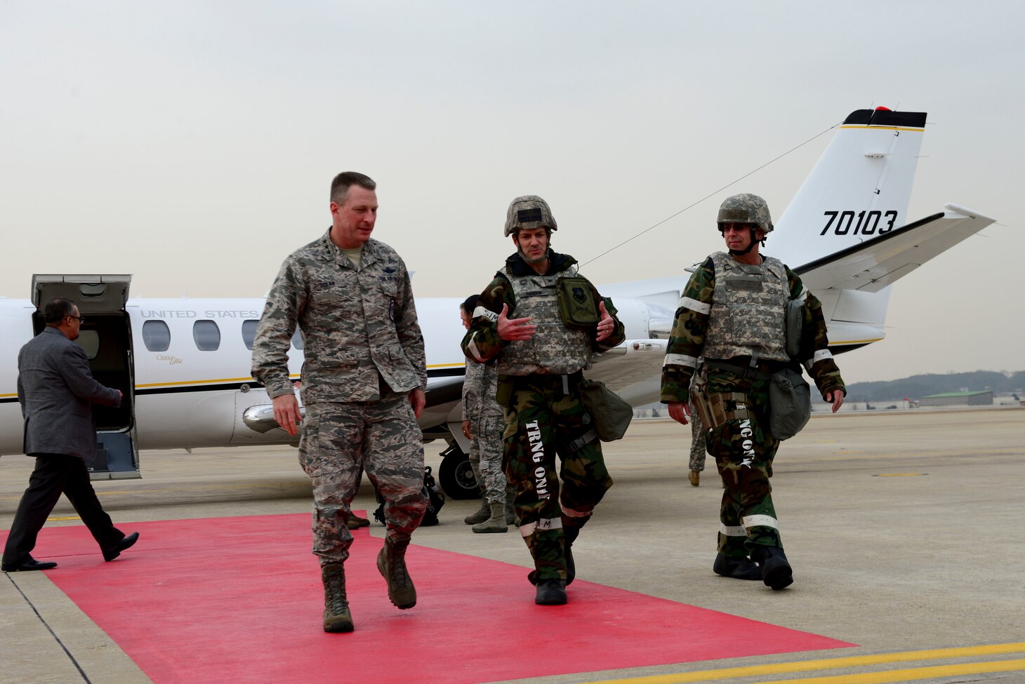 Lt. Gen. John Dolan, U.S. Forces Japan and 5th Air Force commander, meets with Col. Andrew Hansen, 51st Fighter Wing commander and Chief Master Sgt. Alex Del Valle, 51st FW command chief, at Osan Air Base, Republic of Korea, March 7, 2016. Dolan is visiting Osan AB to observe key components of Exercise Key Resolve, to include command and control procedures, the air tasking order coordination process, and the quality of training provided to Air Force personnel. (U.S. Air Force photo by Staff Sgt. Jonathan Steffen/Released)