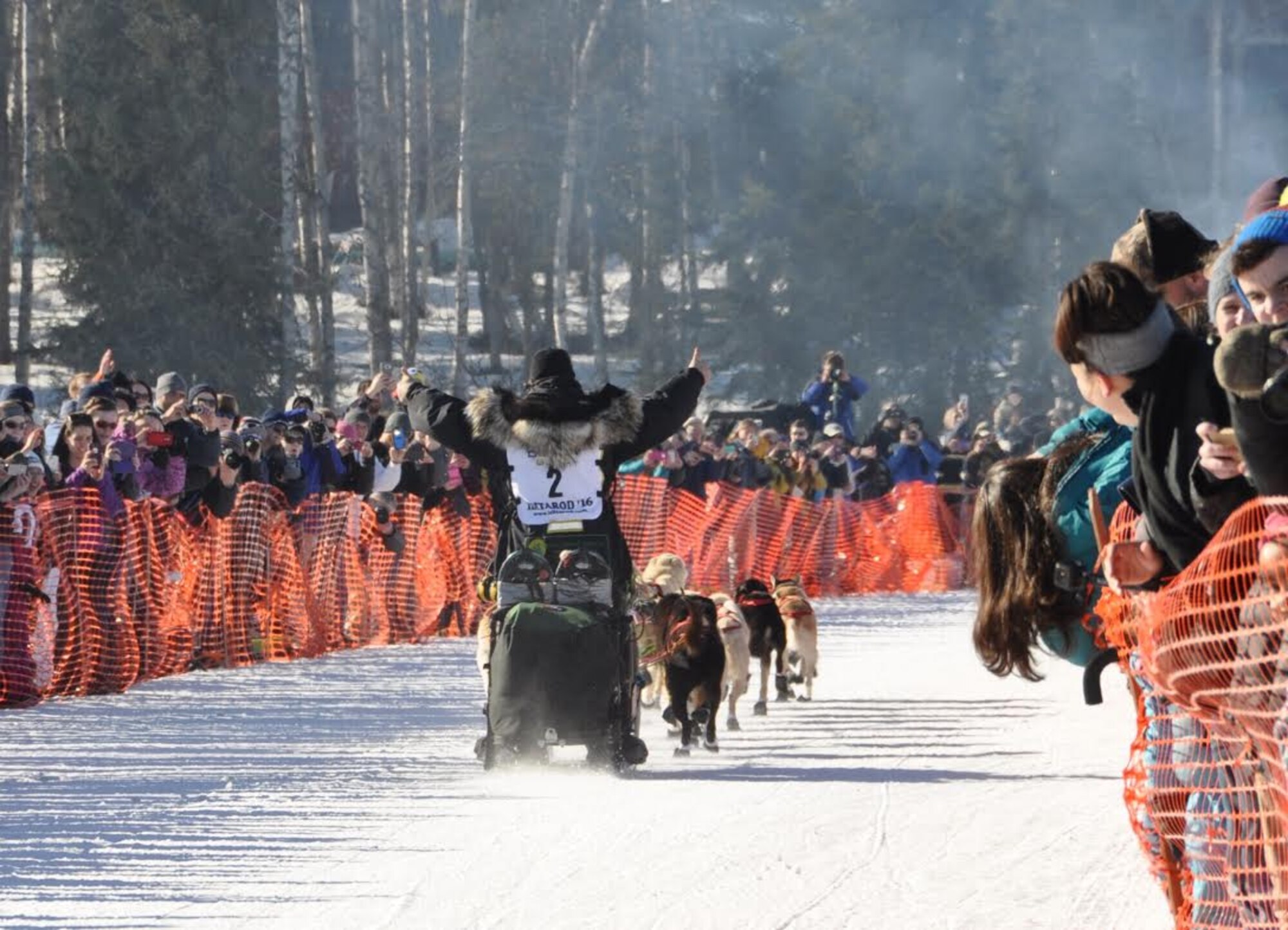 Scott Janssen sets out as the first musher at the Iditarod restart in Willow Alaska, March 6, 2016. Janssen began mushing in 2007 and is known as the “Mushing Mortician” because he has been a mortician and funeral home owner for 29 years. The Iditarod is a 1,000-mile sled dog race across the rugged terrain of Alaska. This is the second year Air Force Reserve Recruiting has sponsored the Iditarod, known as “The Last Great Race on Earth.”(U.S. Air Force/Tech. Sgt. Kimberly Rae Moore)