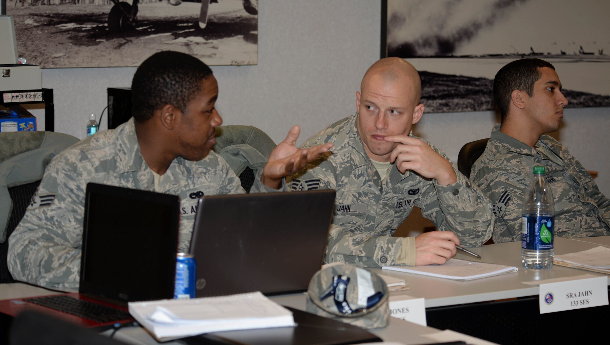 Airmen from Airman Leadership School Class 16-4 participate in a group discussion during class at Ellsworth Air Force Base, S.D., Feb. 25, 2016. ALS provides Airmen the opportunity to experience situations like emergent leadership issues and types of disciplinary problems that may arise. (U.S. Air Force photo by Airman 1st Class Denise M. Nevins/Released)