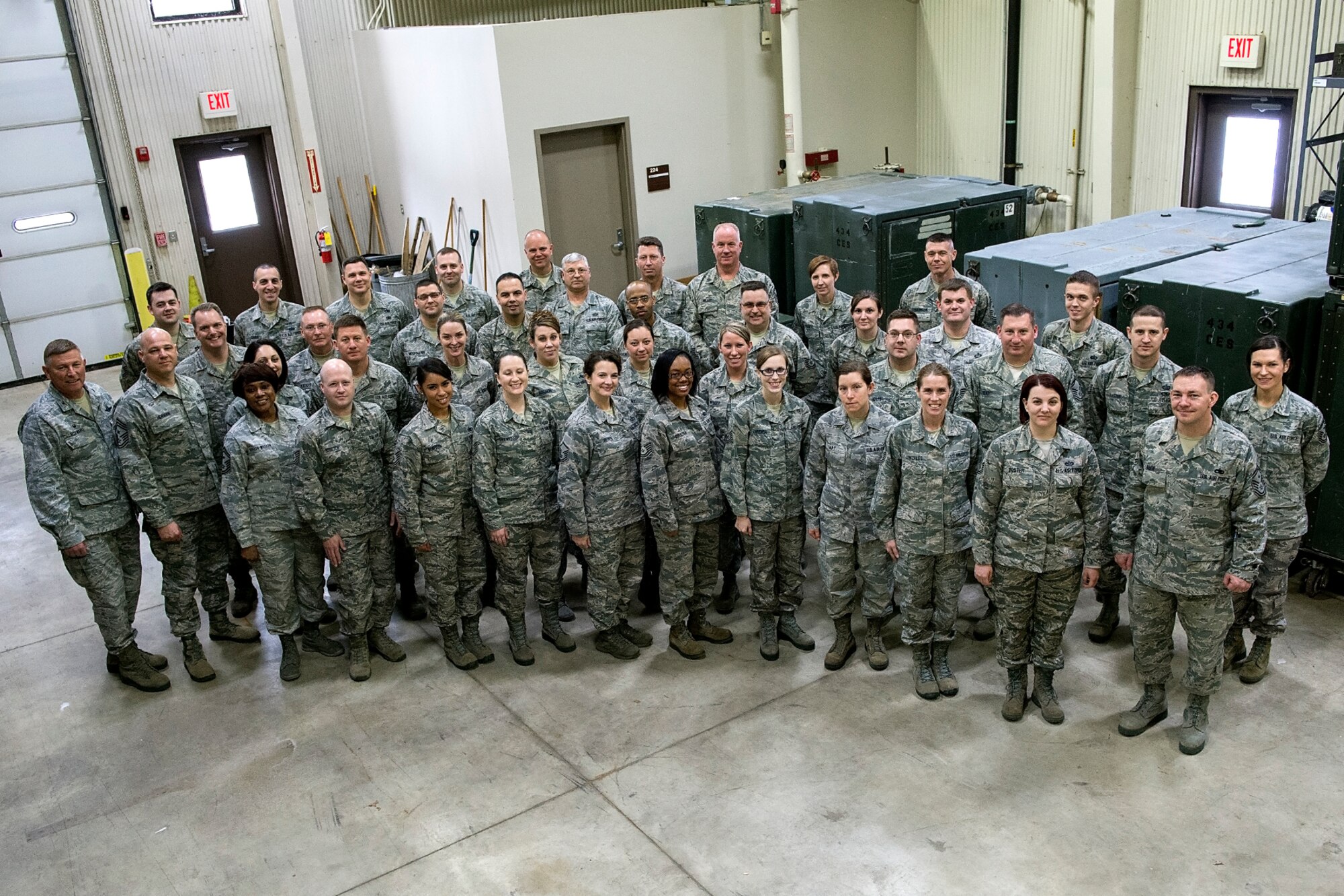 First sergeant symposium participants stand together March 3, 2016, in the civil engineer bay at Grissom Air Reserve Base, Ind. Thirty-five Airmen from seven different wings gathered here to learn the ins-and outs- of the first sergeant career field. (U.S. Air Force photo/Douglas Hays) 