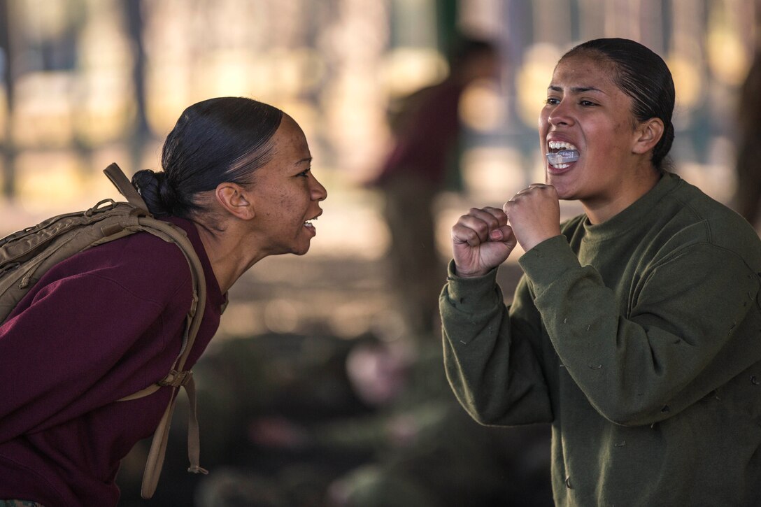 Marine Corps Sgt. Natalia Arenas, left, instructs a recruit on a technique from the Marine Corps Martial Arts Program at Marine Corps Recruit Depot,  Parris Island, S.C., March 3, 2016. Arenas is a drill instructor assigned to November Company, 4th Recruit Training Battalion, Recruit Training Regiment. Marine Corps photo by Sgt. Nathan McKitrick