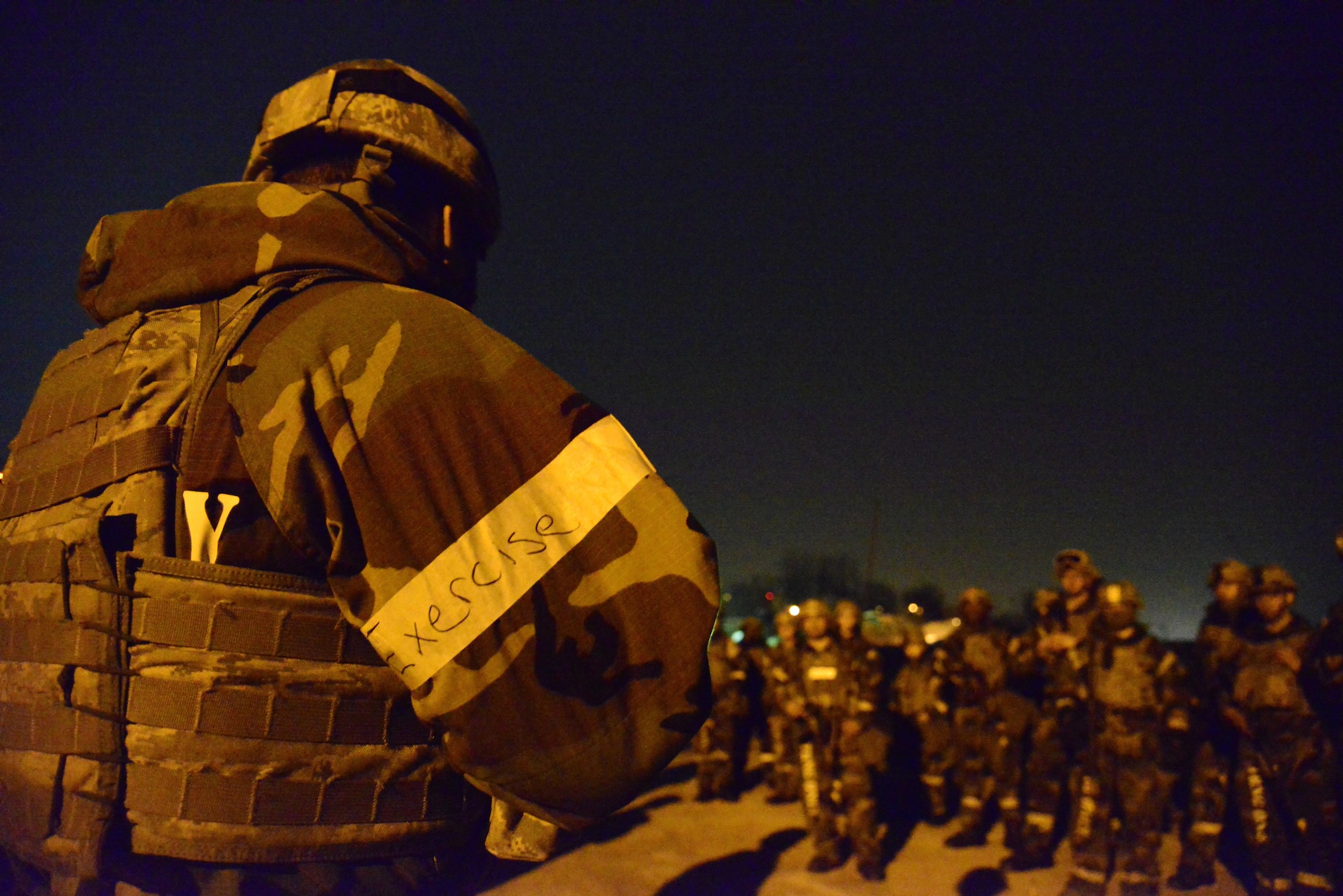 Staff Sgt. Joshua Sams, 51st Security Forces Squadron wing inspection team member, gives an out-brief after a simulated attack during readiness exercise Beverly Midnight 16-01, on Osan Air Base, Republic of Korea, March 8, 2016. Sams discussed the simulated attack to the defenders, giving advice on areas for improvement. The exercise allowed defenders to practice for real-world contingencies while honing combat skills. (U.S. Air Force photo by Senior Airman Kristin High/Released)