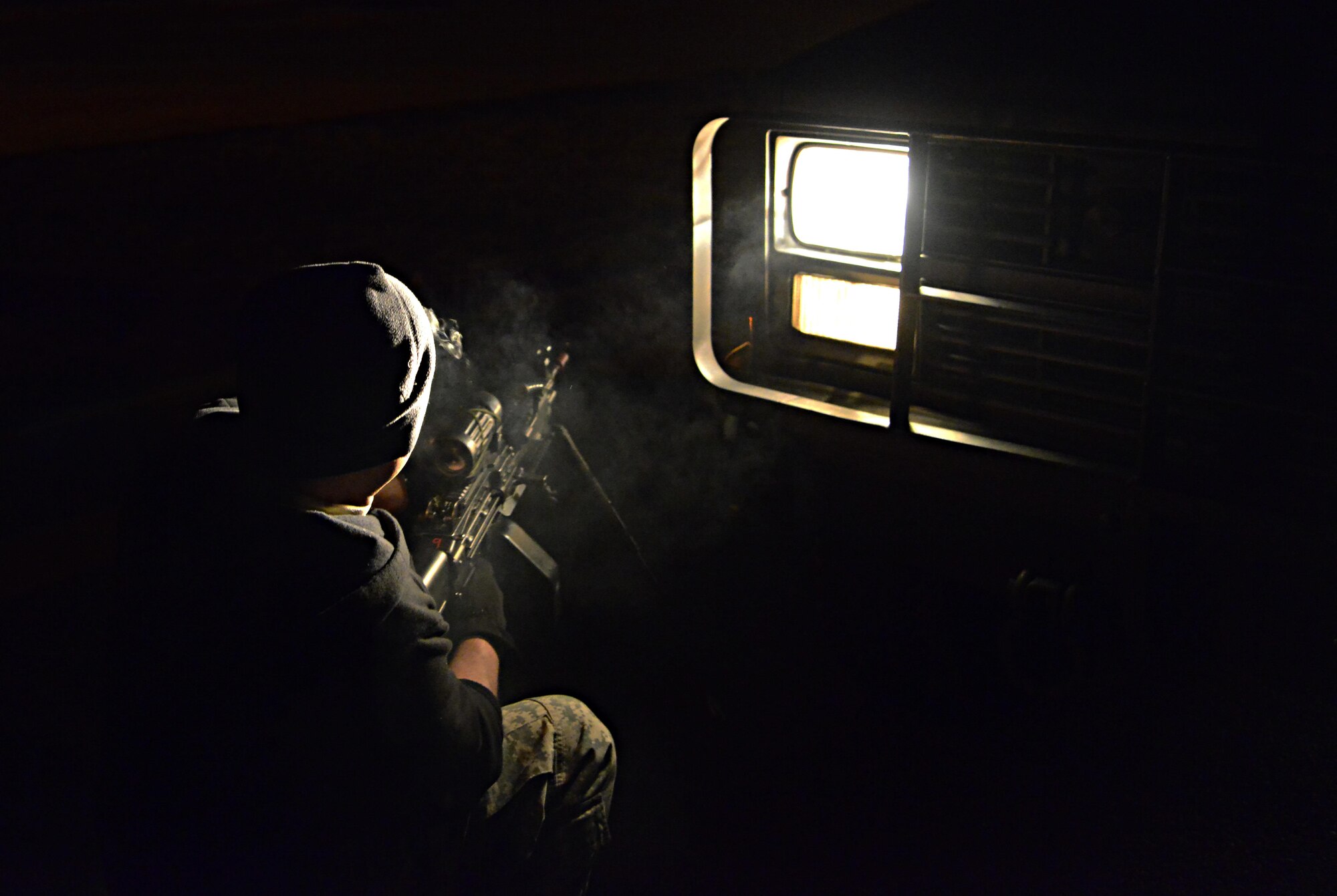 A U.S. Army infantryman acts as opposing forces during readiness exercise Beverly Midnight 16-01, on Osan Air Base, Republic of Korea, March 8, 2016. Beverly Midnight 16-01 provides ROK and U.S. armed forces the opportunity to hone resourceful skills used in the event of real-world contingencies. The 51st Security Forces Squadron utilized Airmen and Soldiers to play opposing forces while teaching them combat skills. (U.S. Air Force photo by Senior Airman Kristin High/Released)