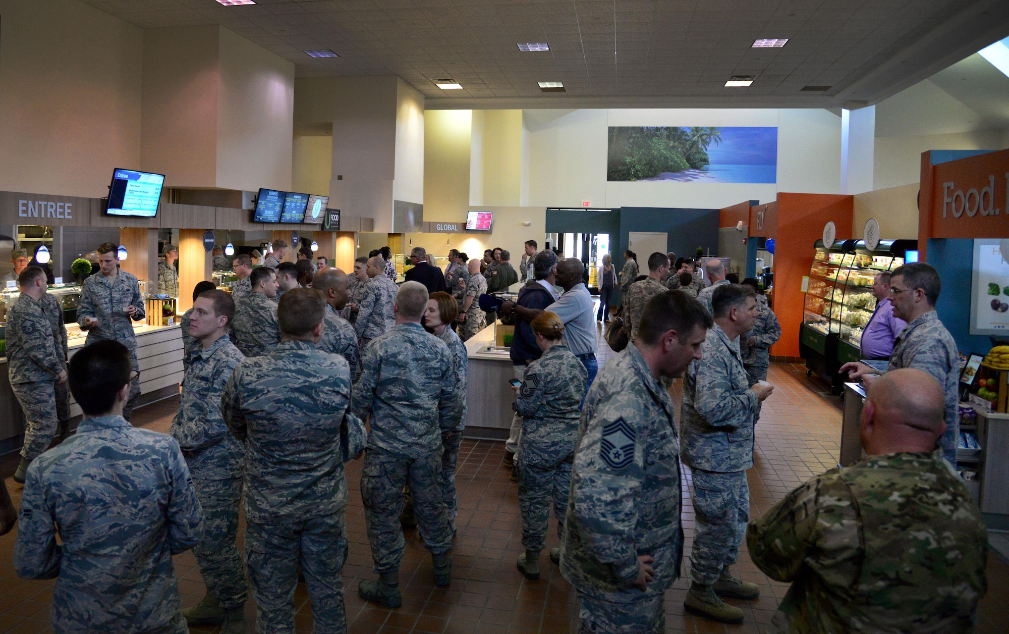 Members from across the 27th Special Operations Wing enjoy a first-hand look of the new Pecos Trail Dining Facility March 3, 2016, at Cannon Air Force Base, N.M. Now that the DFAC has re-opened, Air Commandos are able to use their meal cards at any NAF-operated facility on base; to include places like the Drop Zone’s Tailgate Sports Lounge, Kiosk in Hangar 4609, Chip Shot Dining Room at the golf course, Cannon Lanes snack bar in the bowling center, and Landing Zone. (U.S. Air Force photo/Staff Sgt. Alexx Pons) 