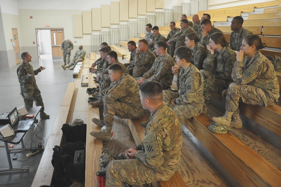 Maj. Jason Winkelmann, 542nd Forward Engineer Support Team - Advanced commander, briefs Soldiers of the 10th Brigade Engineer Battalion at Hunter Army Airfield March 4. Winkelmann shared contrasting insight on USACE organizational structures as part of the two-day leadership development program. The program offers junior officers and senior non-commissioned officers a glimpse of consequential Corps projects and its span of career opportunities. 