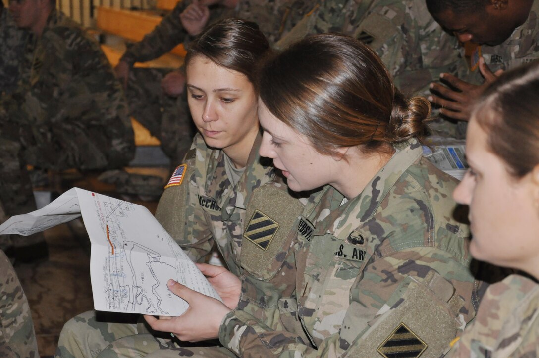 Junior officers of the 10th Brigade Engineer Battalion review maps outlining parameters of the Savannah harbor deepening project during a briefing at Hunter Army Airfield March 4. Participants got a glimpse of Corps missions during a tour of operations at Thurmond Dam’s power plant and a site visit to Hunter Army Airfield’s resident engineer office. District leaders shared contrasting insight on USACE organizational structures and provided overviews of major projects including the Savannah Harbor deepening and Fuel Island upgrades.