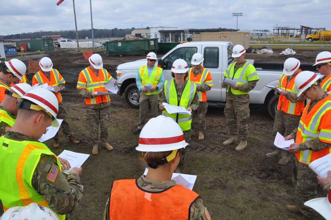 Capt. Jennifer Bellamy, a branch chief in Savannah's Construction Division, briefs Soldiers of the 10th Brigade Engineer Battalion on fuel island upgrades at Hunter Army Airfield March 4. The briefing was part of a two-day leadership development program designed to expose junior officers and senior non-commissioned officers to Corps missions.