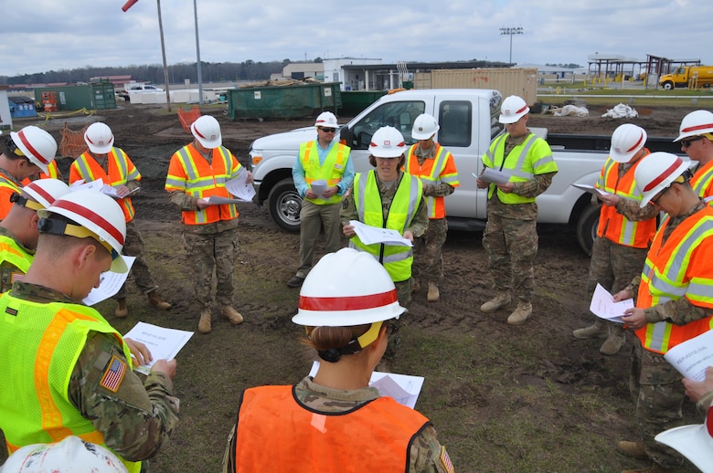 Capt. Jennifer Bellamy, a branch chief in Savannah's Construction Division, briefs Soldiers of the 10th Brigade Engineer Battalion on fuel island upgrades at Hunter Army Airfield March 4. The briefing was part of a two-day leadership development program designed to expose junior officers and senior non-commissioned officers to Corps missions.