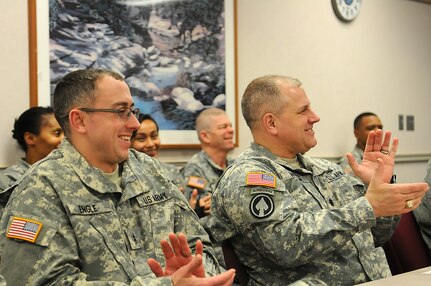 Army Reserve soldiers from the 85th Support Command applaud Chicago Actress Cynthia Maddox on her one-woman show about five influential African-American women through history. The program called Five Famous African-American Women was performed at the command headquarters for a combined observance of Black History and Women’s History Month, March 5, 2016. (U.S. Army photo by Spc. David Lietz/Released)