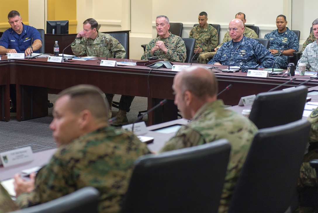 Marine Corps Gen. Joseph F. Dunford Jr., center back, chairman of the Joint Chiefs of Staff, meets with Navy Adm. Kurt W. Tidd, commander, U.S. Southern Command, and other leaders at the command's headquarters in Miami, March, 8, 2016. DoD photo by Navy Petty Officer 2nd Class Dominique A. Pineiro