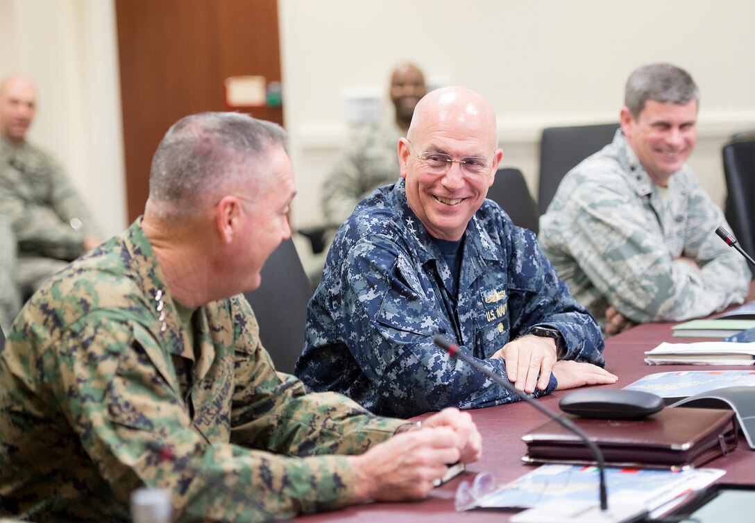 Marine Corps Gen. Joseph F. Dunford Jr., left, chairman of the Joint Chiefs of Staff, shares a light moment with Navy Adm. Kurt W. Tidd, commander, U.S. Southern Command, at the command's headquarters in Miami, March, 8, 2016. DoD photo by Navy Petty Officer 2nd Class Dominique A. Pineiro