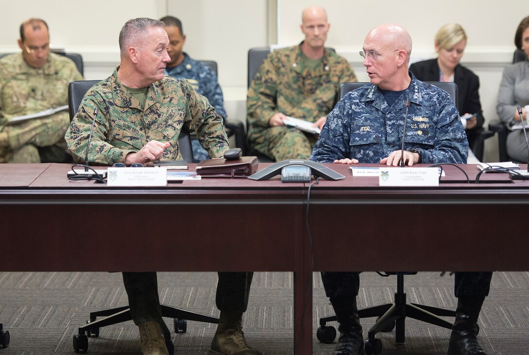 Marine Corps Gen. Joseph F. Dunford Jr., left, chairman of the Joint Chiefs of Staff, meets with Navy Adm. Kurt W. Tidd, commander, U.S. Southern Command, at the command's headquarters in Miami, March, 8, 2016. DoD photo by Navy Petty Officer 2nd Class Dominique A. Pineiro