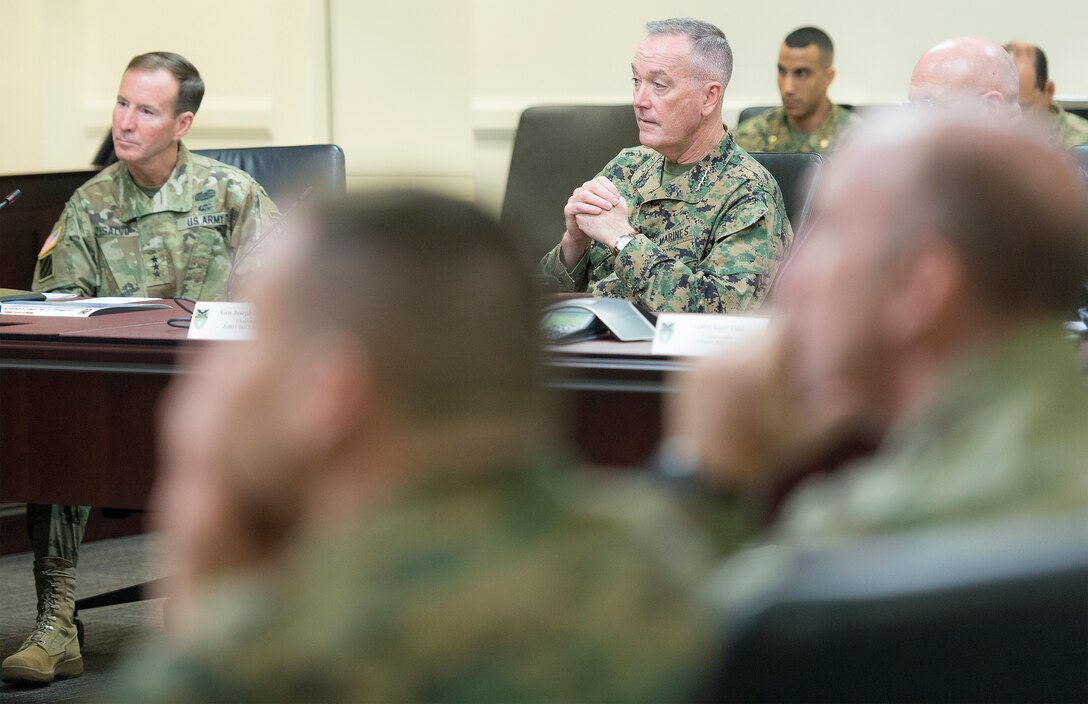 Marine Corps Gen. Joseph F. Dunford Jr., center, chairman of the Joint Chiefs of Staff, listens during a meeting at U.S. Southern Command's headquarters in Miami, March, 8, 2016. DoD photo by Navy Petty Officer 2nd Class Dominique A. Pineiro