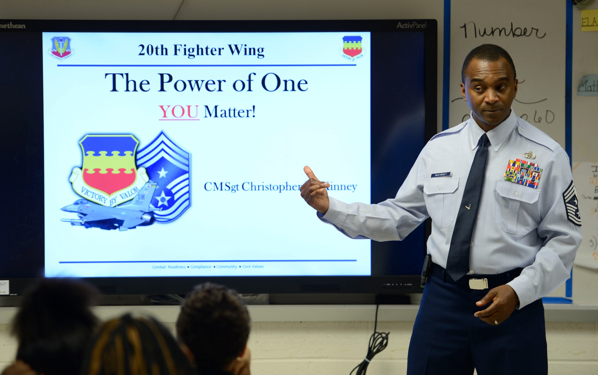 U.S. Air Force Chief Master Sgt. Christopher McKinney, 20th Fighter Wing command chief, speaks to students at F.J. Delaine Elementary School in Wedgefield, S.C., March 1, 2016. During the visit, McKinney gave the children advice to help them go from being ordinary to extraordinary. (U.S. Air Force photo by Senior Airman Jensen Stidham)