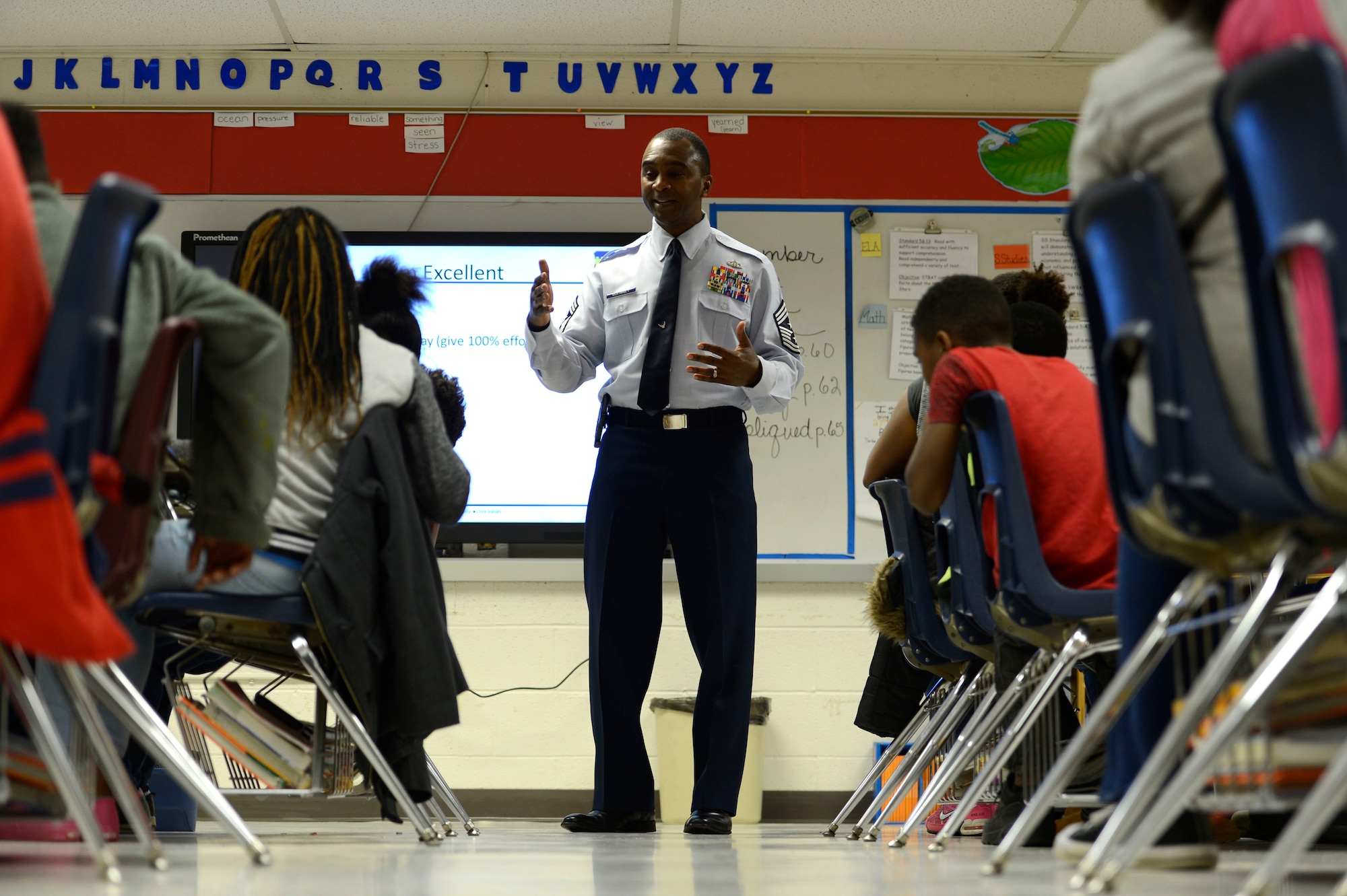 U.S. Air Force Chief Master Sgt. Christopher McKinney, 20th Fighter Wing command chief, speaks to students at F.J. Delaine Elementary School in Wedgefield, S.C., March 1, 2016. More than 25 fifth grade students learned about excellence and had the opportunity to ask the chief questions. (U.S. Air Force photo by Senior Airman Jensen Stidham)