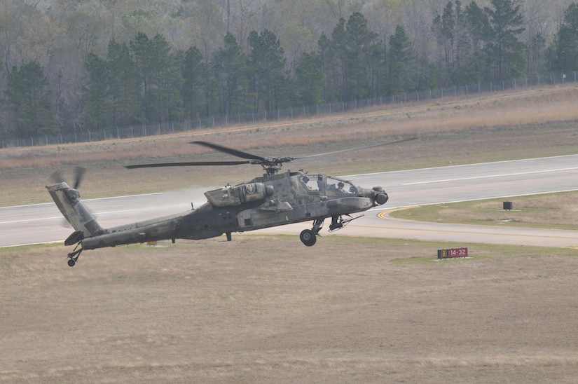 An AH-64 Apache Helicopter, from 1-158th Assault Reconnaissance Battalion (ARB), conducts last official flight while under a U.S. Army Reserve command in Conroe, Texas, Mar. 6, 2016. 1-158th ARB is a direct reporting unit to the 11th Theater Aviation Command. The 11th Theater Aviation Command (TAC) is the only aviation command in the Army Reserve. (U.S. Army Photo by Capt. Matthew Roman, 11th Theater Aviation Command Public Affairs Officer)