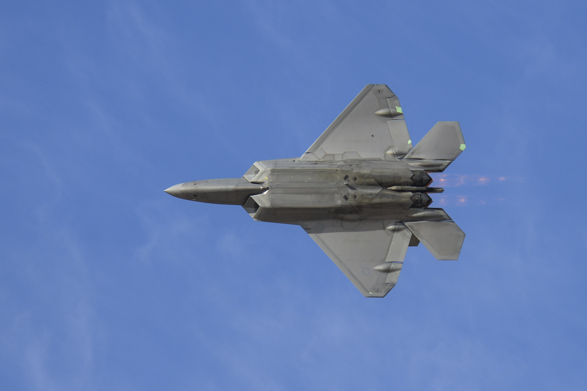 A U.S. Air Force F-22 Raptor performs an aerial maneuver during the 2016 Heritage Flight Training and Certification Course at Davis-Monthan Air Force Base, Ariz., March 4, 2016. The Raptor performs both air-to-air and air-to-ground missions allowing full realization of operational concepts vital to the 21st century Air Force. (U.S. Air Force photo by Senior Airman Chris Massey/Released