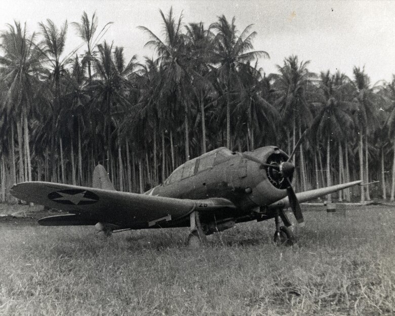 Capt. David E. McCafferty, GRC, Coll #3208, PC 615, Box 2, Folder: McCafferty, David E., WWII Photos - Aviation-Guadalcanal

This picture from the Special Collections of the Archives Branch of the Marine Corps History Division shows VMSB-232’s “MB-26” on Guadalcanal shortly after the squadron arrived on August 20, 1942. This image was key in the restoration of the NMMC’s SBD-3 Dauntless, which is marked as “MB-21.”